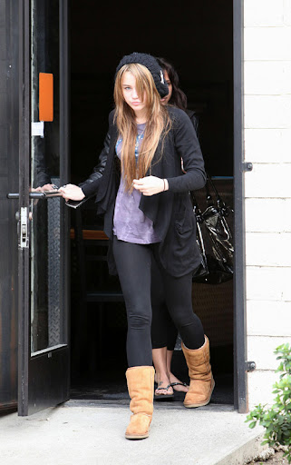 29445, LOS ANGELES, CALIFORNIA - Saturday 21st March 2009. Miley Cyrus heads to Dan's Sushi in Studio City with boyfriend Justin Gaston. Miley was unusually shy and hid her face from cameras but still smirked when photographers called out her name. Photograph: James Breeden/Max Butterworth/PacificCoastNews.com ***FEE MUST BE AGREED PRIOR TO USAGE*** UK OFFICE: +44 131 557 7760/7761/7762 US OFFICE: + 1 310 261 9676
