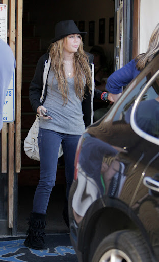 Miley Cyrus leaves Katsu-Ya restaurant after an early dinner in Studio City Los Angeles, California - 20.05.09 Mandatory Credit: WENN.com