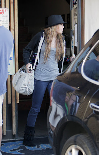 Miley Cyrus leaves Katsu-Ya restaurant after an early dinner in Studio City Los Angeles, California - 20.05.09 Mandatory Credit: WENN.com