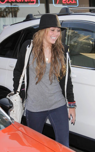 Miley Cyrus leaves Katsu-Ya restaurant after an early dinner in Studio City Los Angeles, California - 20.05.09 Mandatory Credit: WENN.com