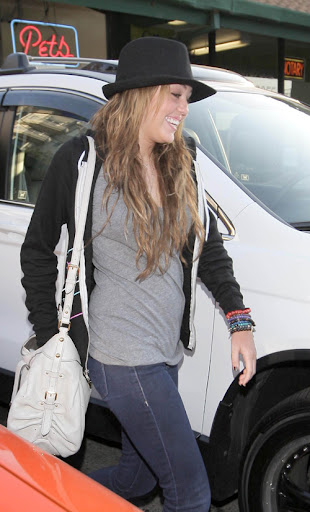 Miley Cyrus leaves Katsu-Ya restaurant after an early dinner in Studio City Los Angeles, California - 20.05.09 Mandatory Credit: WENN.com
