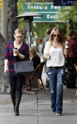 31543, LOS ANGELES, CALIFORNIA - Monday June 8th, 2009.  Hilary and Hayley Duff are seen joining each other for coffee at the Aroma Cafe. Hilary was seen putting change into her and older sister Hayley's parking meter.  Photograph: Nate Jones/PacificCoastNews.com ***FEE MUST BE AGREED PRIOR TO USAGE*** UK OFFICE: +44 131 557 7760/ 7761/ 7762 US OFFICE: + 1 310 261 9676