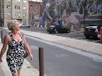 Julia with a great dress walking down the streets of Philadelphia
