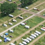 There's our camper - between the trees to the right of the blue tarp