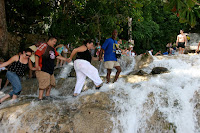 Tourists being dragged up the falls
