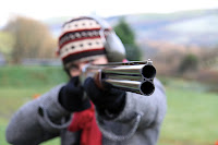 Shelley posing with the gun