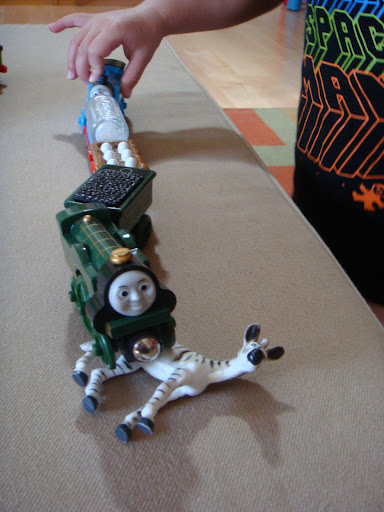 jack made sure the train ran over the zebra as he exclaimed, oh, no! over and over again..