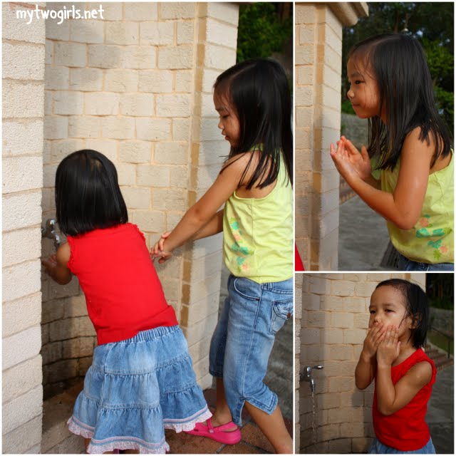 Girls washing themselves with spring/holy water