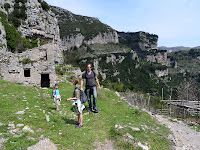 A demolished, ancient, limestone kiln fascinates the girls.