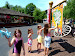 The older girls plan the attack.  The park is nearly empty.