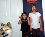 Monty makes scary faces with Emma and Lily