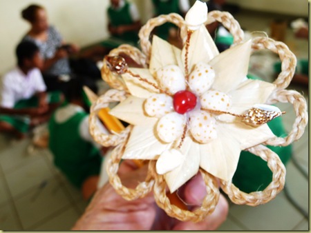 Making flowers from tapa cloth--the teacher gave me hers to put in my hair
