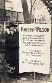 Viriginia Arnold holding the infamous Kaiser Wilson banner outside the White House, August 1917