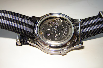 The display back of the Seiko SNK809, showing the 7S26B movement The display back of the Seiko SNK809, showing the 7S26B movement