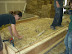 The last course of bales fit tightly into the form