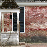 A well behind a house in the Restored Area of Colonial Williamsburg.