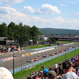 Looking towards the final turn as the field comes to the green on a restart.