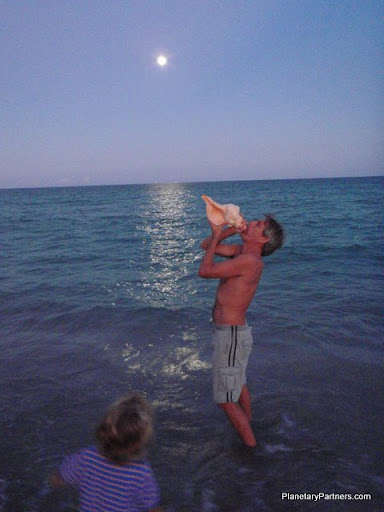 Blowing the conch shell to the Ocean (I am her Fan!) Clicking on this photo takes you to my Facebook Fan Page