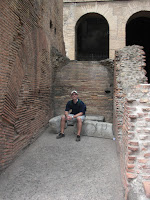 Chris in the Colesseum chillin on some ruins