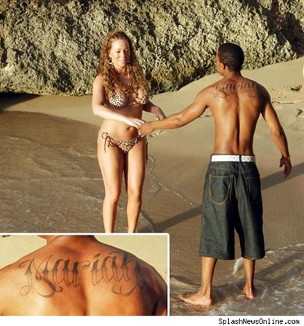 tatuaje en la espalda de Nick Cannon. nick-cannon-mariah-carey-tattoo