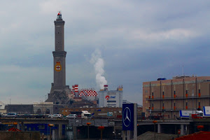 Genoa Lighthouse. With a sort of built on factory.