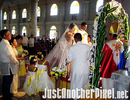 Another photo of the short wedding ceremony - JustAnotherPixel.net