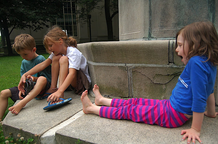 Lounging on a monument at MIT