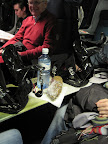 The snowboard, the sandwich and the water.