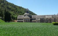 an abbey in the valley near gordes. mad hilltop and hillside village