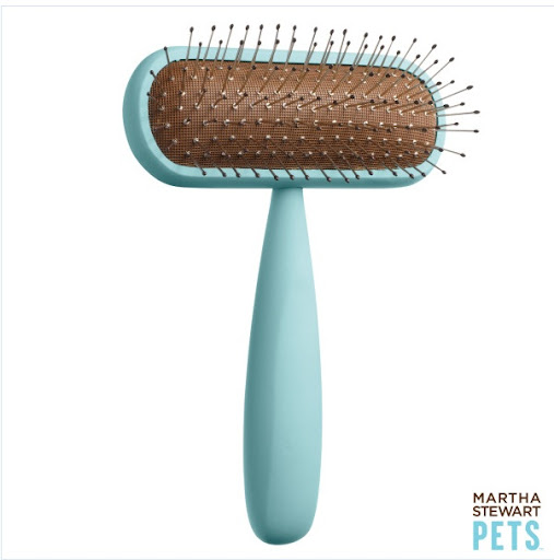 The short pill-shaped pin brush is for medium-length haired dogs.