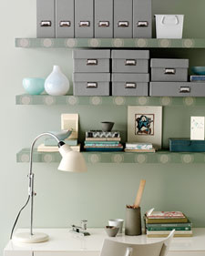 Add a splash of personality to a lackluster work space by covering plain floating bookshelves with wallpaper. Add a splash of personality to a lackluster work space by covering plain floating bookshelves with wallpaper.