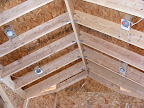 Recessed lighting cans in the playroom