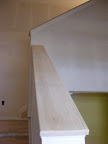 Wooden rail on banister