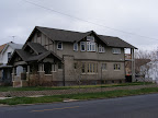 Front and side of house almost completely painted
