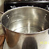 This is two gallons of water, just put on to boil. My electric range takes 45-55 minutes to boil the two gallons on the back burner. I still find that it is quicker on the back than the front burner, which is larger. I don't know why. Cover your tamale pot, and wait 35 minutes, then...