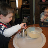 Erik practices transfering by spoon and pouring