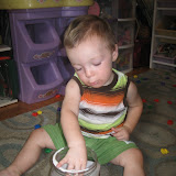 Kai likes taking things out and putting things in -- a great way to keep him busy!
