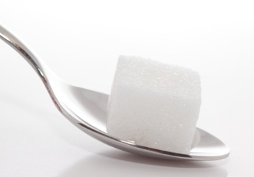 sugar cube on spoon