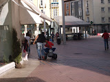 A little boy rides his power wheels through the streets of Burgos.