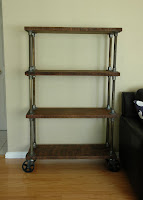 French Industrial Bookcase / Bookshelf on cast iron casters - http://shop.retro.net/?cat=46