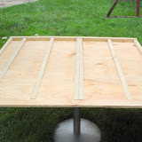 Here's an upside-view of the subfloor I made for the entryway. I ripped down 1x2's to use as giant shims, to make it level