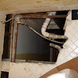 In addition to being poorly framed, what framing was near the toilet was rotted, so it all had to go. Bye bye to my new tile floor