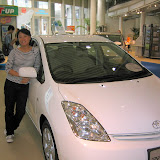 Maria with her favorite car in the Megaweb showroom