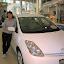 Maria with her favorite car in the Megaweb showroom