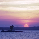 The Gull Rocks Lighthouse, sometime before the dwelling was destroyed in 1961 - photograph copyright Jim Nash