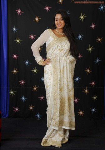 [tollywood-actress-charmi-in-designer-white+saree_actressinsareephotos_blogspot_com_26[2].jpg]