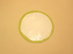 A completed circle will look like this - not perfect from this side, but all fabric has been secured to the edges in smooth curves.