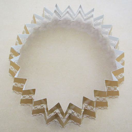 Then I glued the ends of the strip together and turned the completed, folded loop on end.