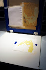 Lifting the screen to reveal the print. Lifting the screen to reveal the print.