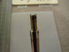 when the rhinestone is in the Hotfix tool, the flat back should be facing up